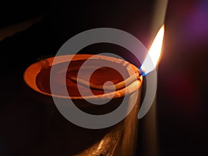 Glowing clay lamp Happy diwali festive seasonÂ 